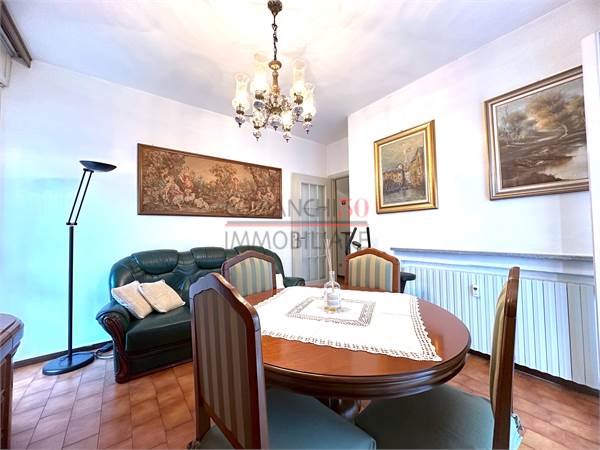 INTRA, LUMINOSO TRILOCALE CON TERRAZZA, CANTINA E GARAGE