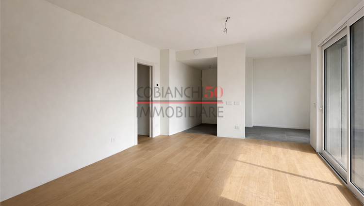 LIVING CON TERRAZZA E CUCINA 
