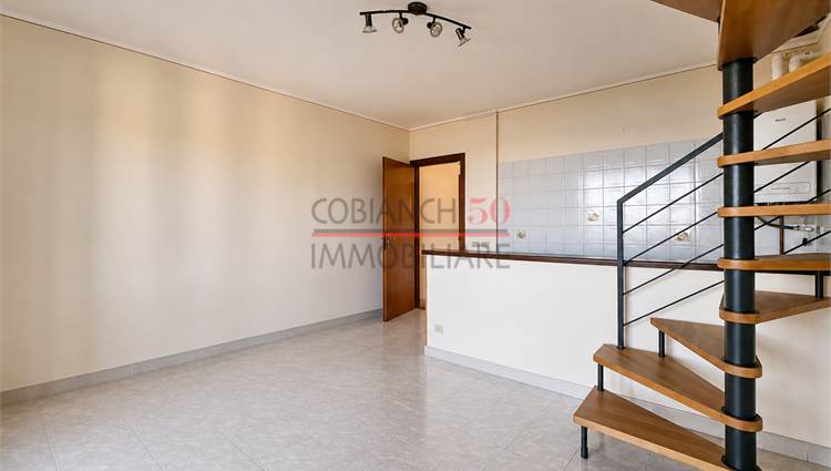 Soggiorno con cucina e terrazza