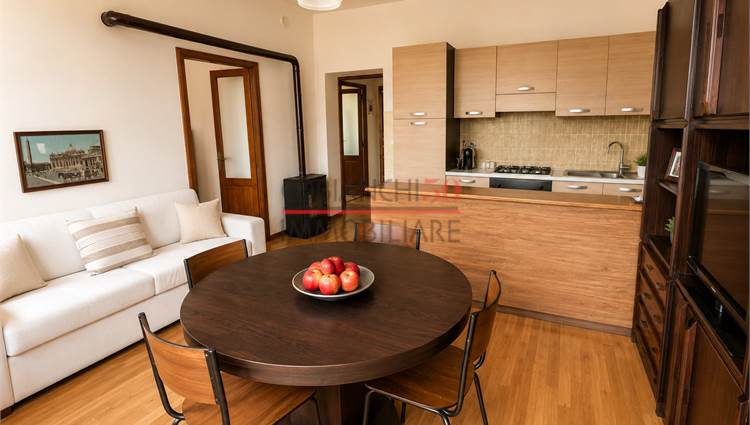 soggiorno con cucina e balcone 